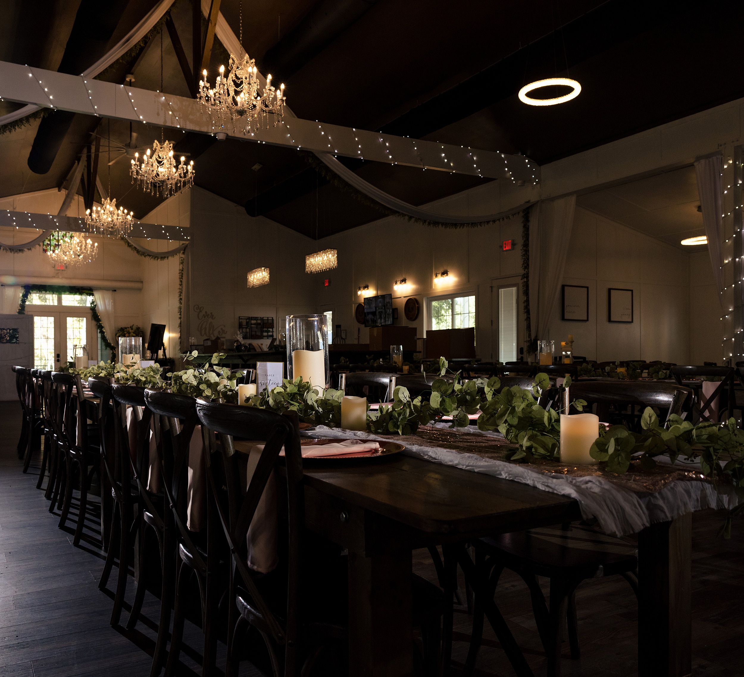 Details of an ever after farms weddings wedding ceremony set up with long tables