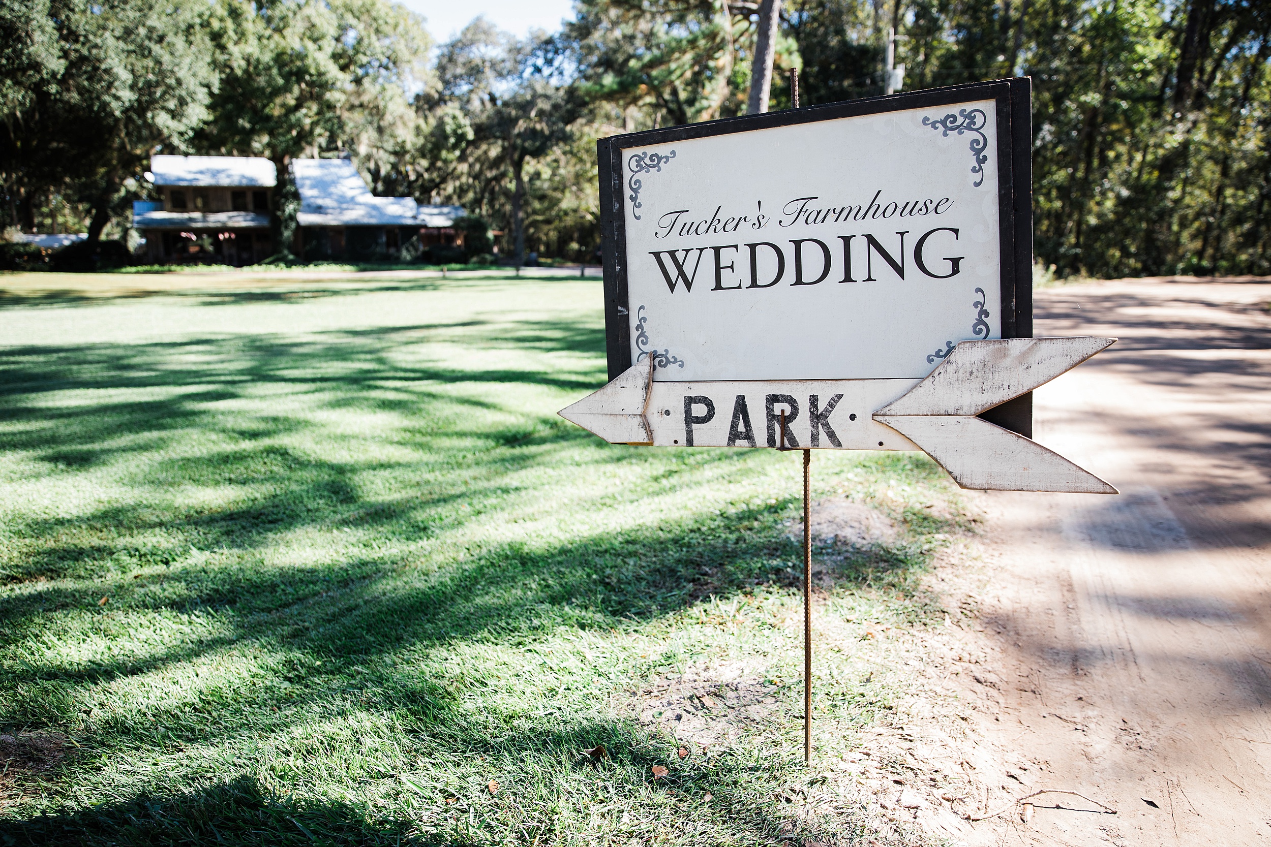 Details of a wedding ceremony parking sign of a rustic Florida wedding venue